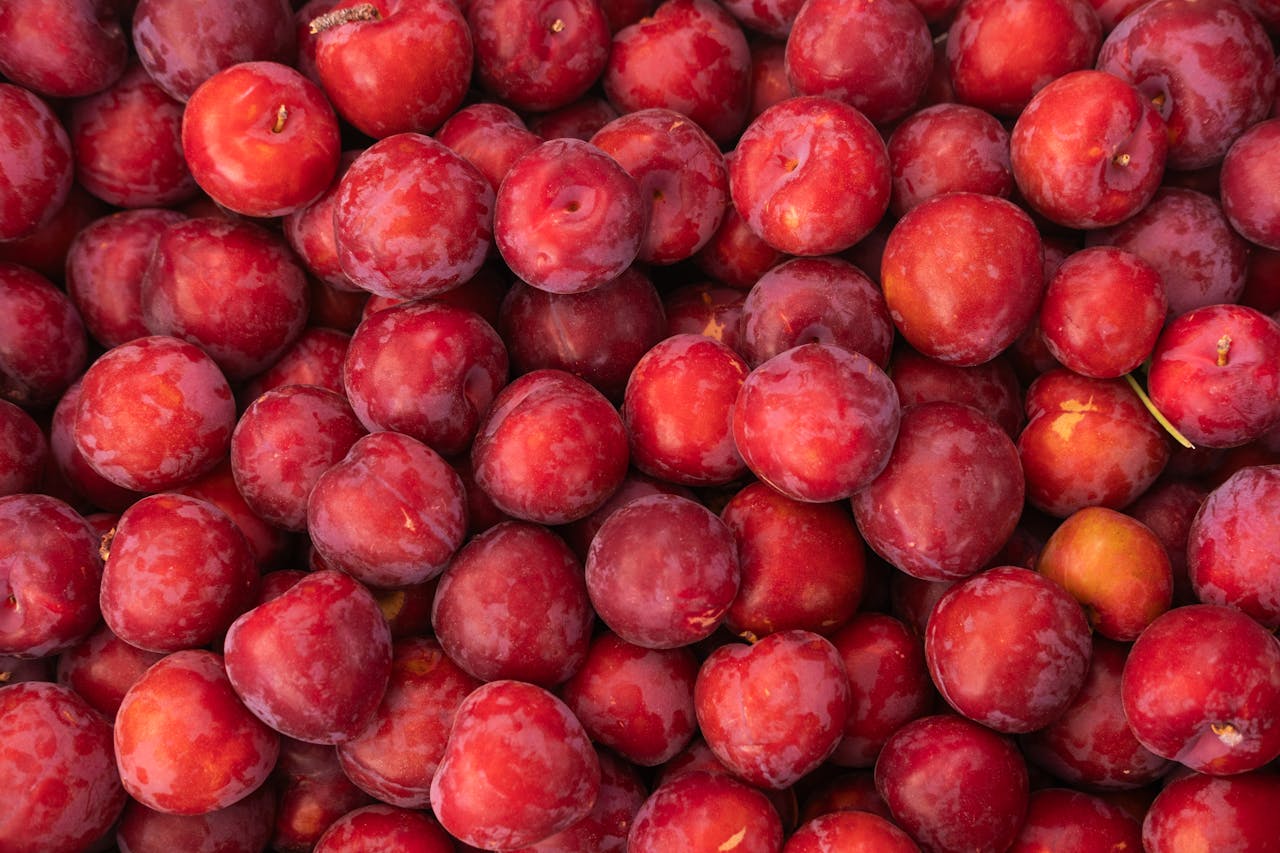A close-up shot of fresh red peaches from a market in Bornova, İzmir, Türkiye.